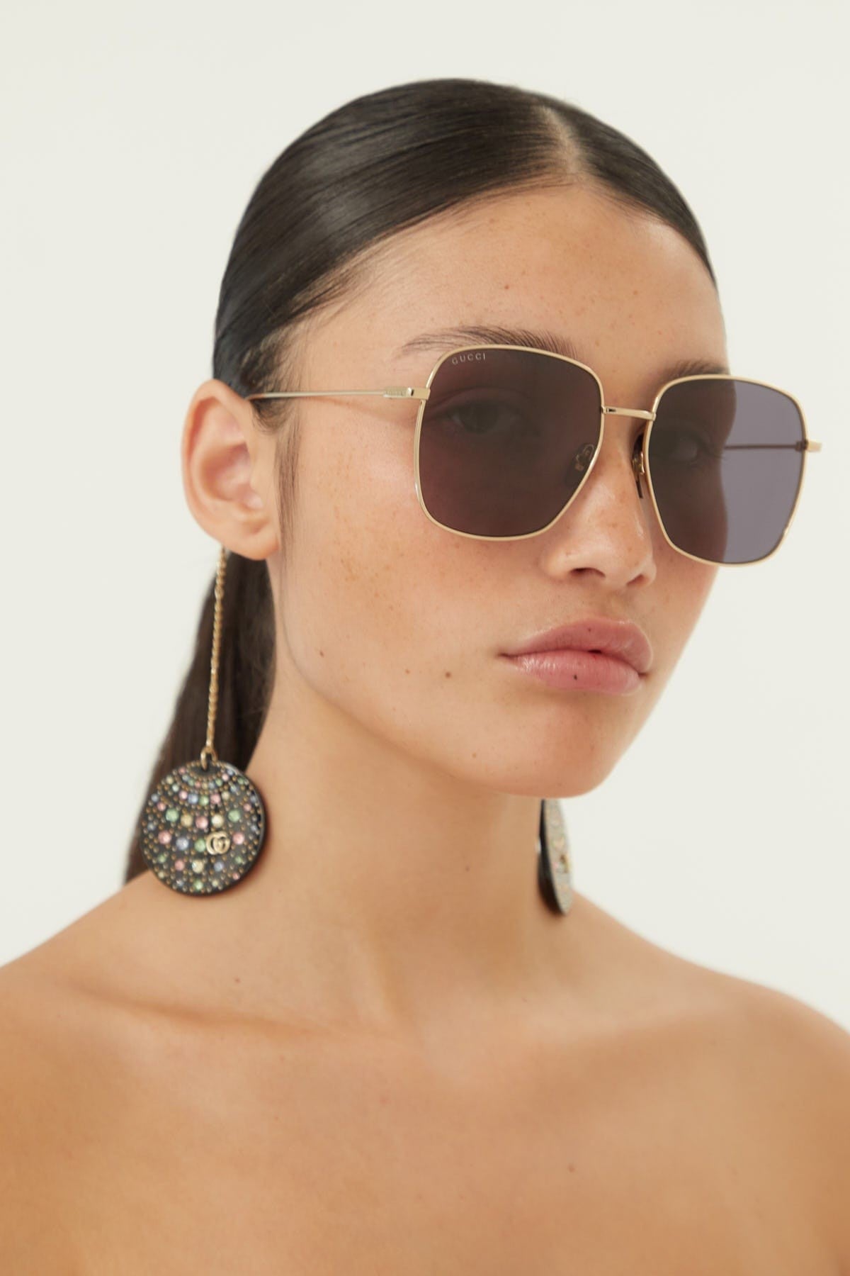 Gucci gold squared sunglasses with disco ball charms