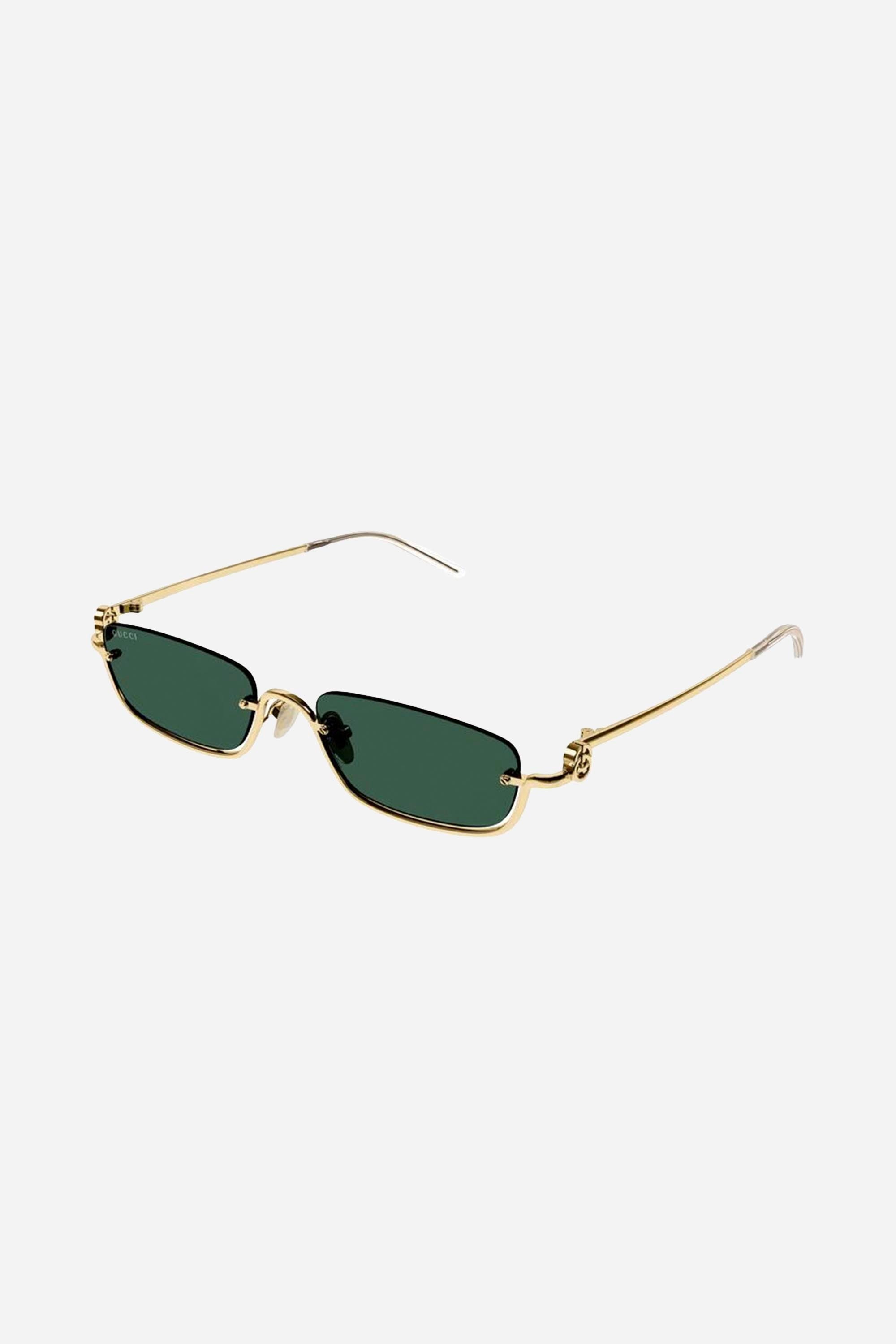 Gucci micro metal sunglasses featuring green lenses