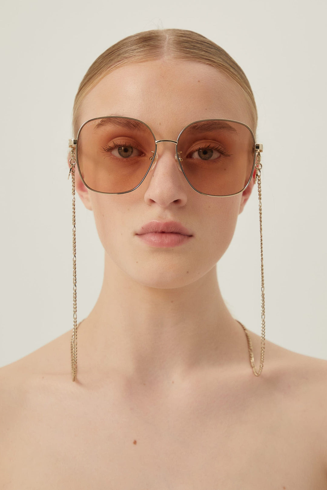 Gucci round metal sunglasses with chain