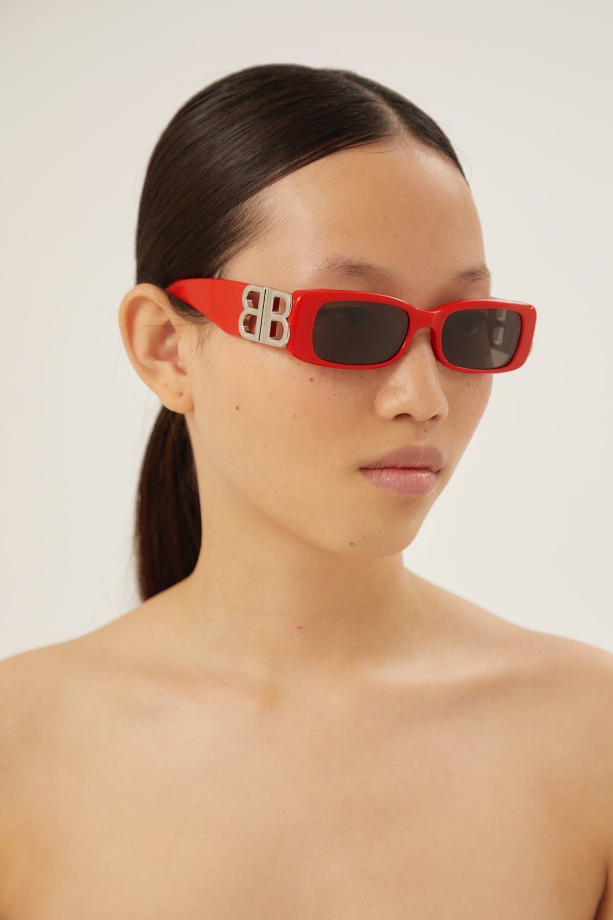 Balenciaga Dynasty red sunglasses featuring BB logo