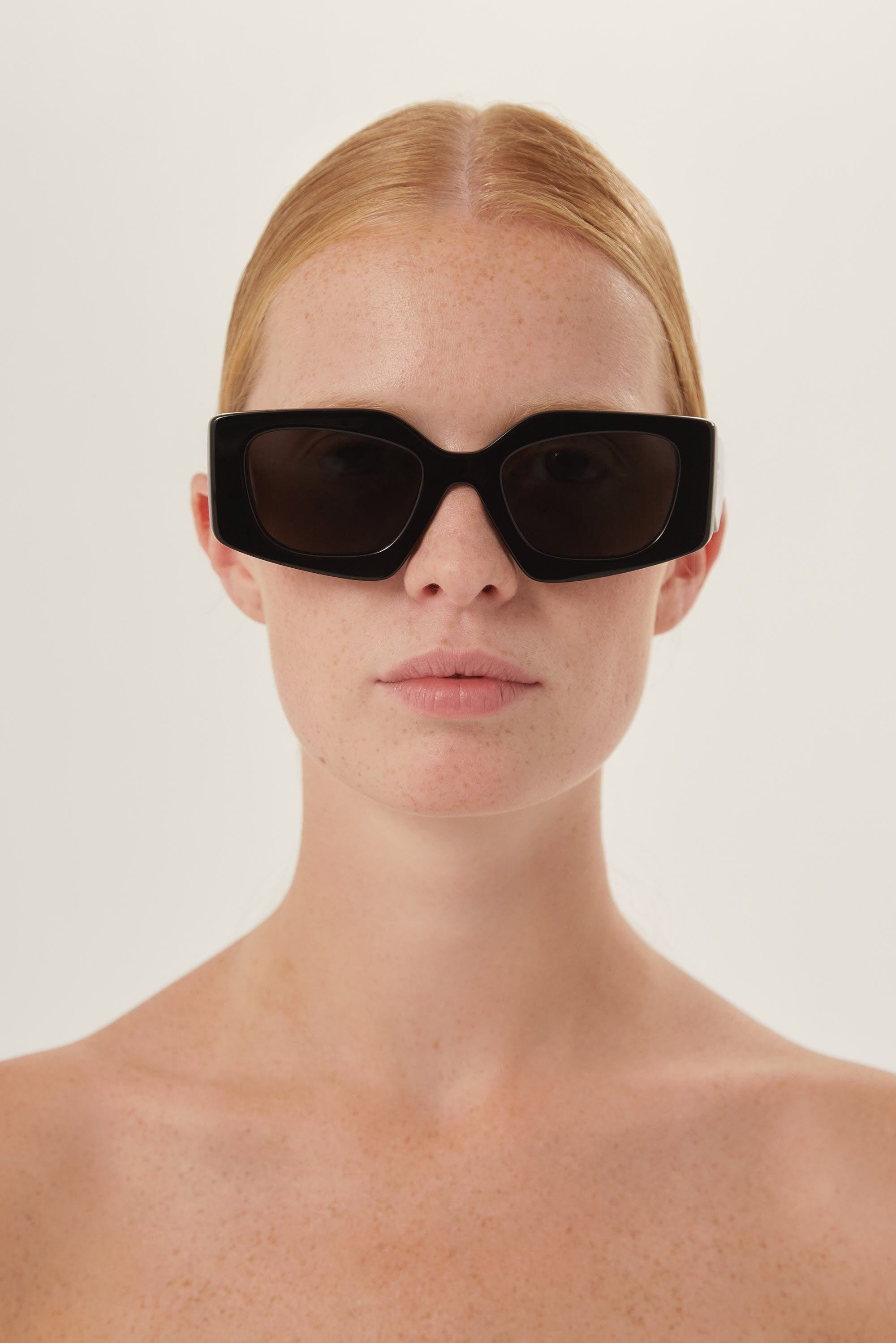 Prada geometrical black sunglasses