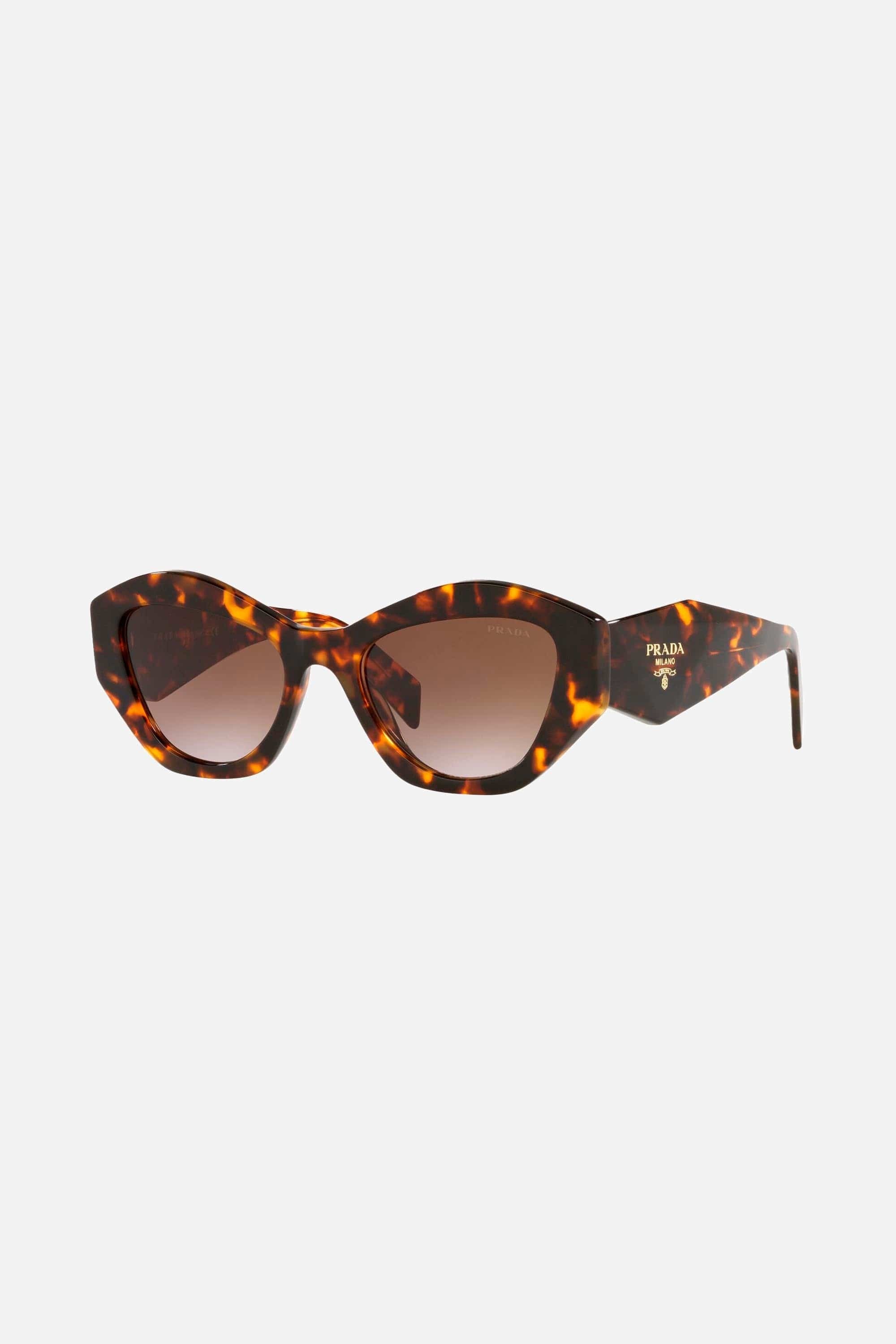 Prada oval sunglasses featuring iconic logo