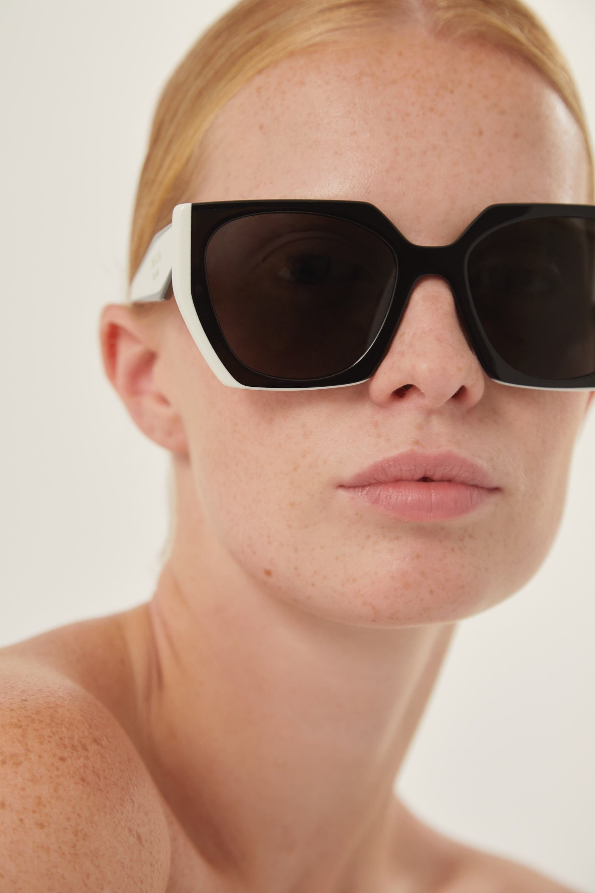 Prada oversized cat eye black and white sunglasses