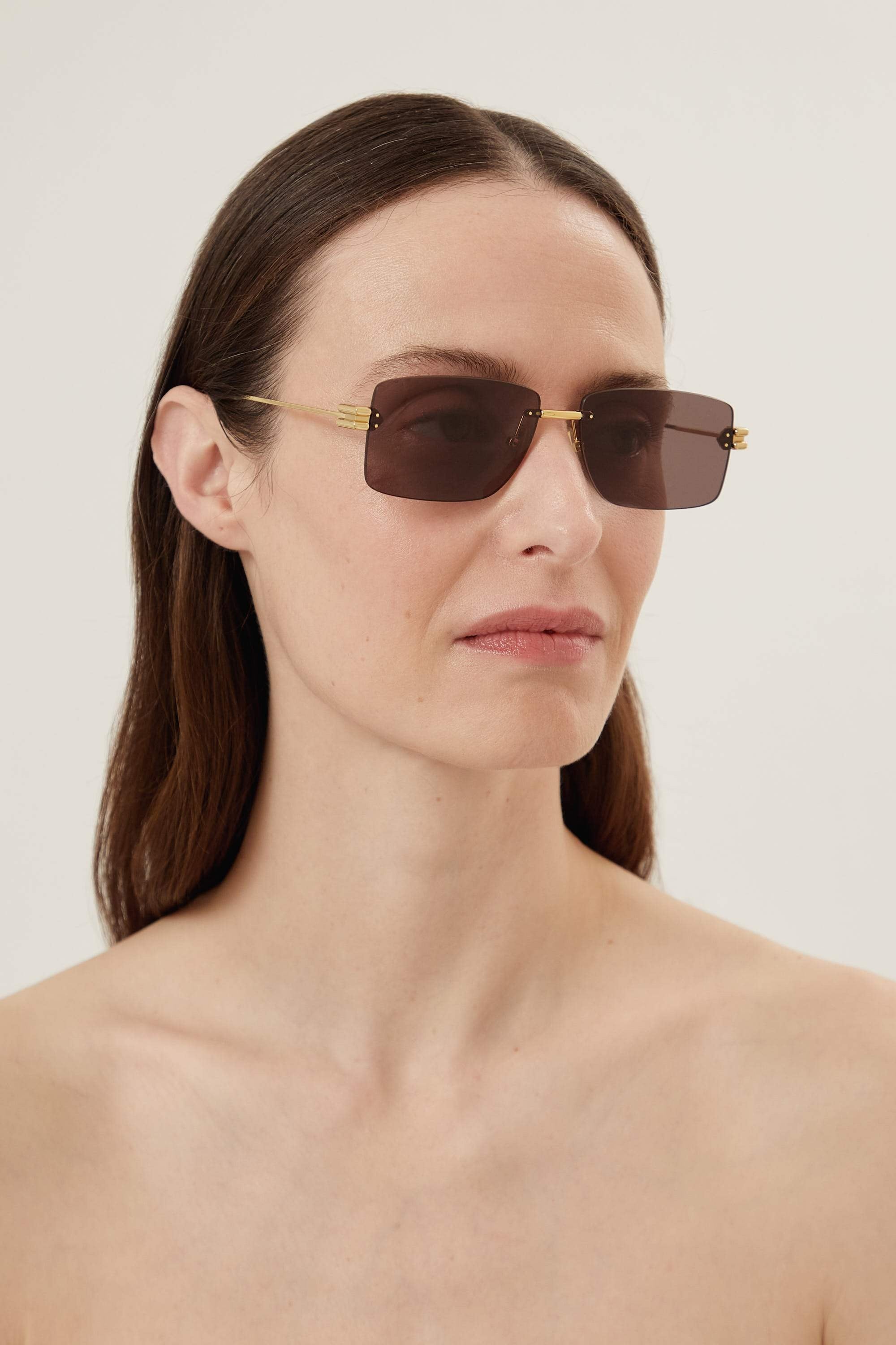 Bottega Veneta rimless brown and gold sunglasses