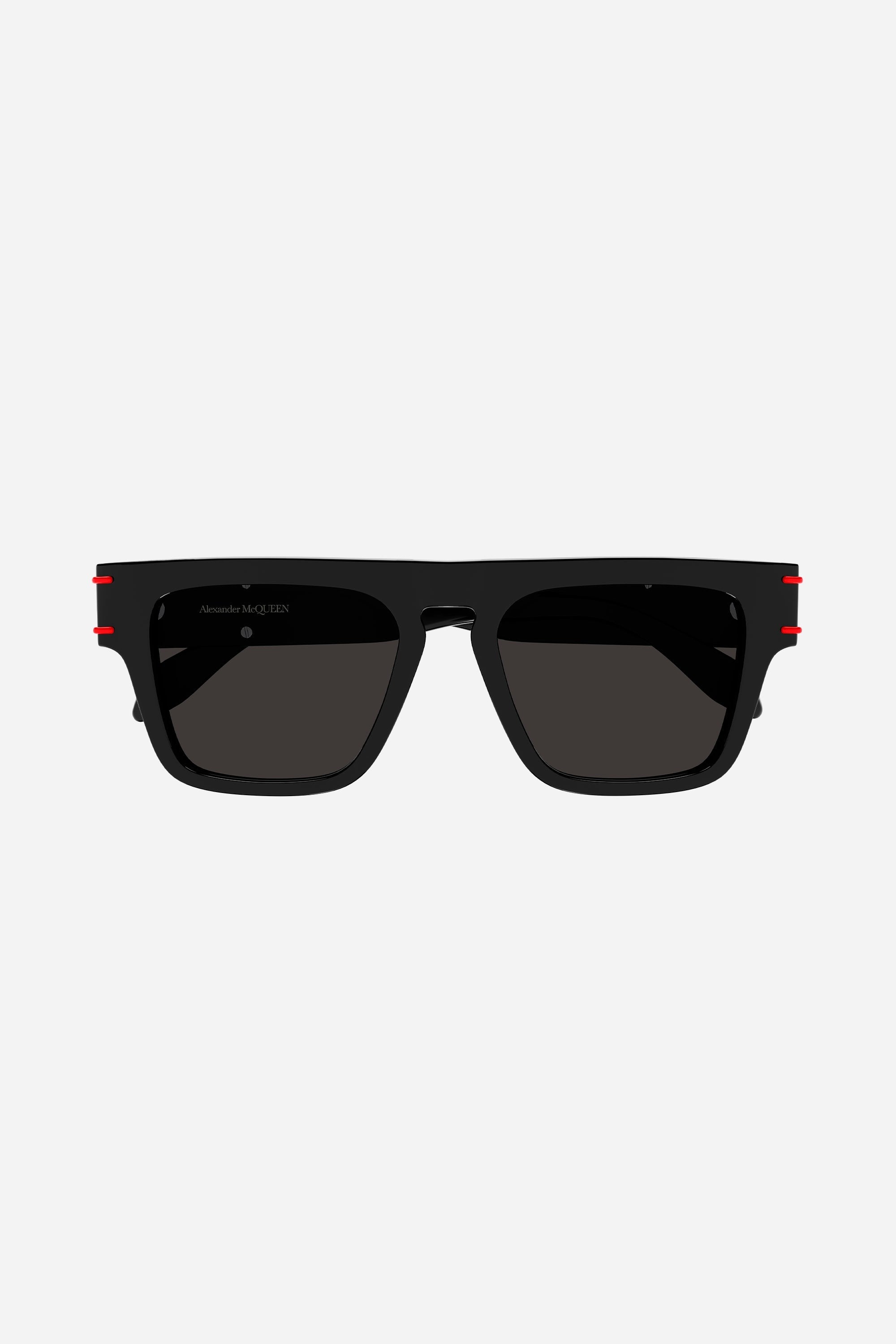 Alexander McQueen black sunglasses with red details on the sides