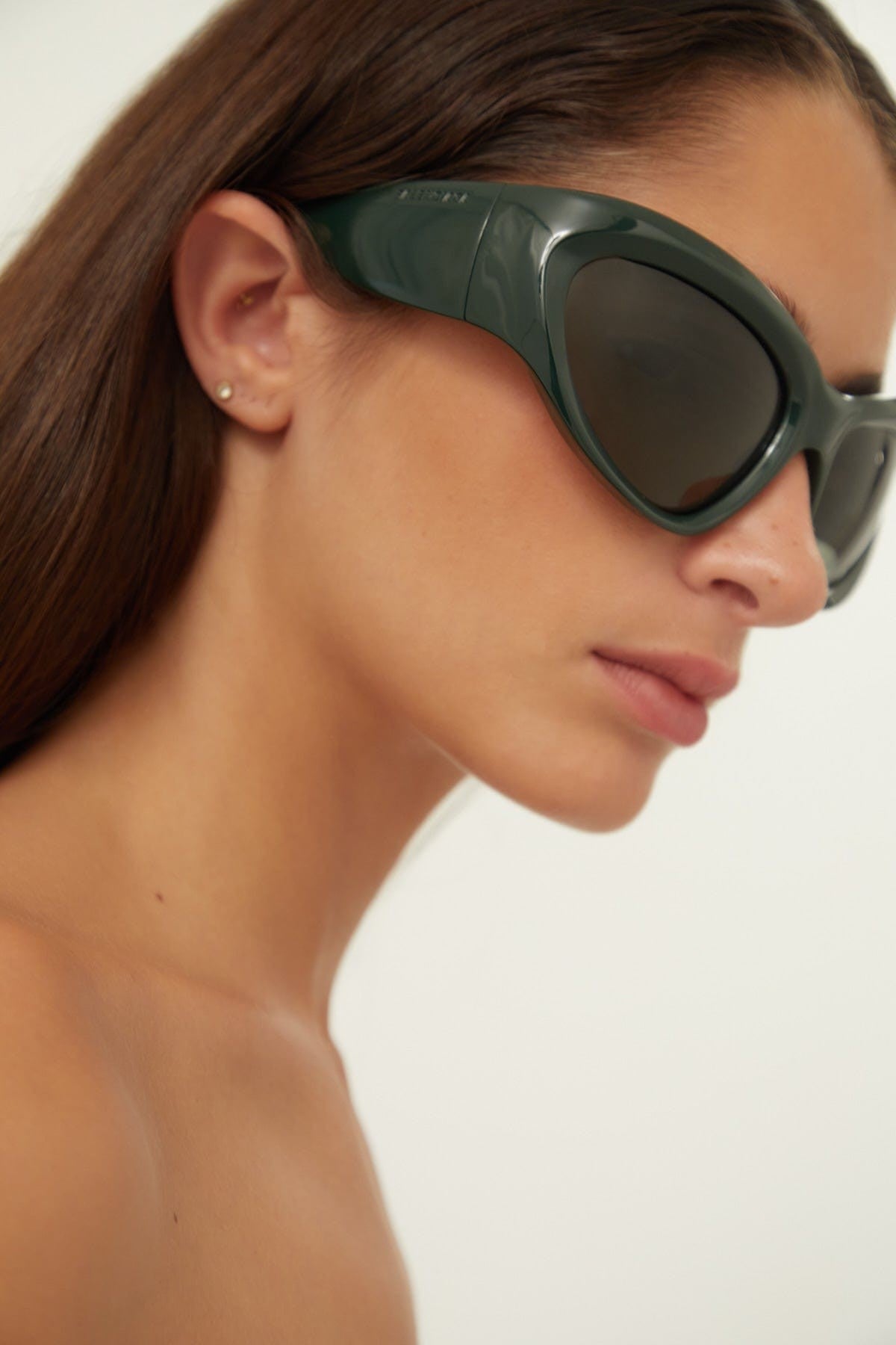 Balenciaga bold wrap around green sunglasses