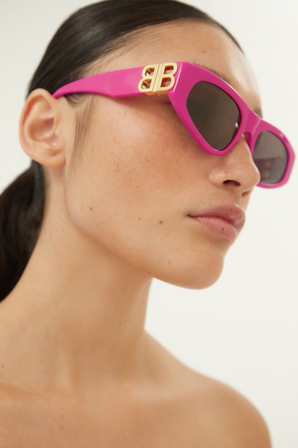 Balenciaga pink and gold cat-eye BB sunglasses