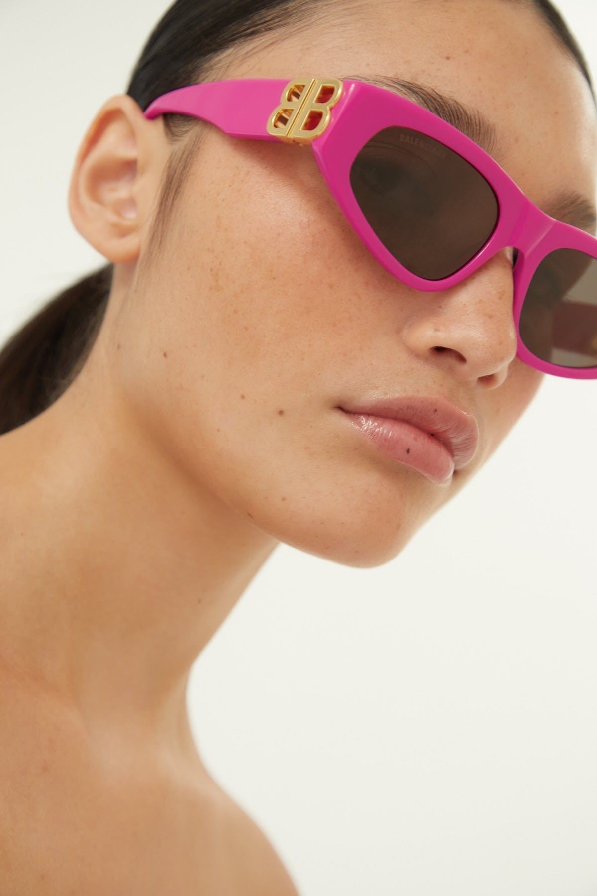 Balenciaga pink and gold cat-eye BB sunglasses