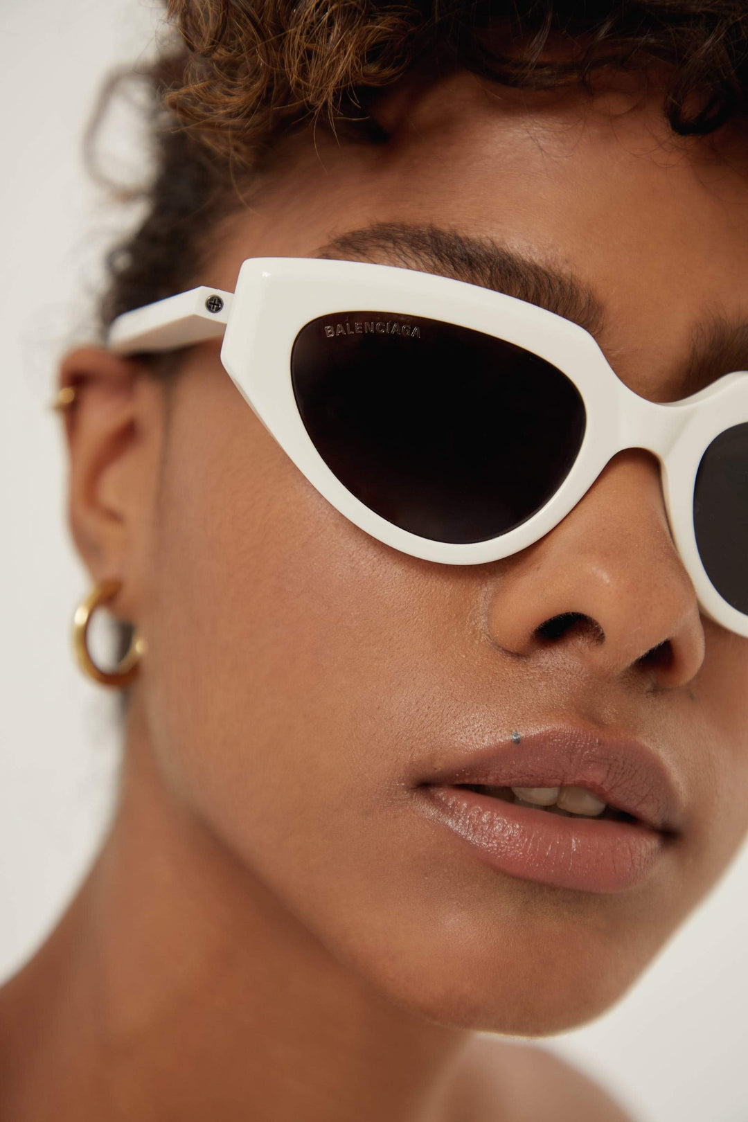 Balenciaga white cat eye sunglasses with black logo