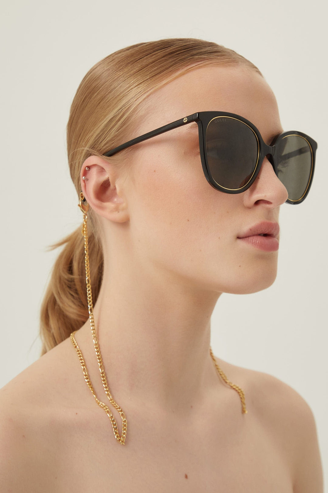 Gucci black cat-eye sunglasses with chain