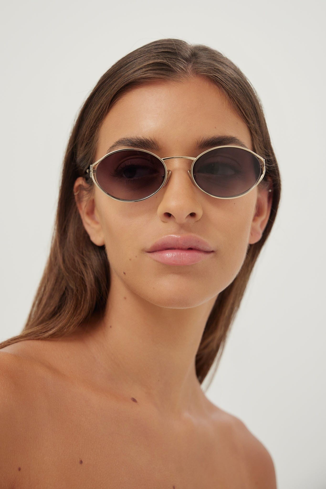 Miu Miu oval metal  sunglasses with grey lenses