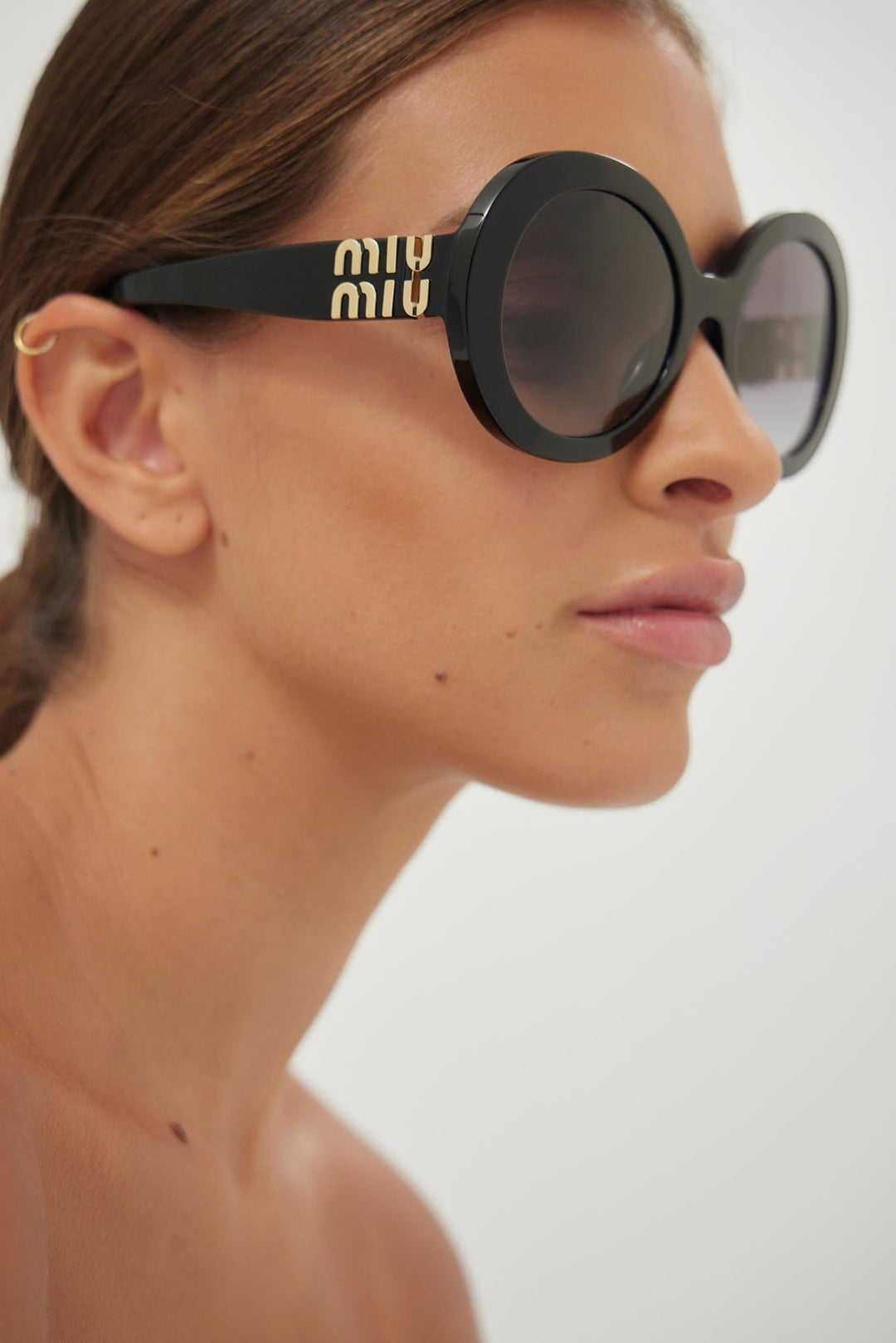 Miu Miu round black sunglasses – Eyewear Club - Main Image