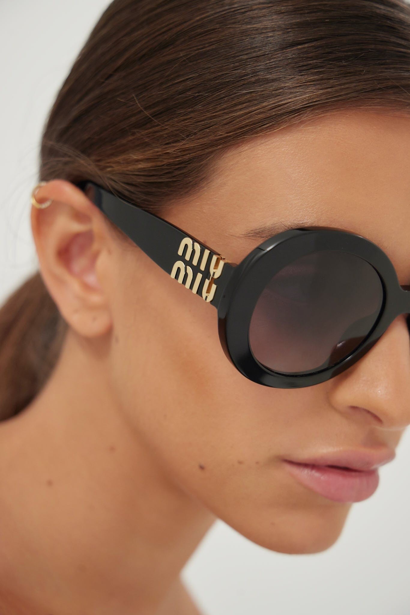 Miu Miu round black sunglasses