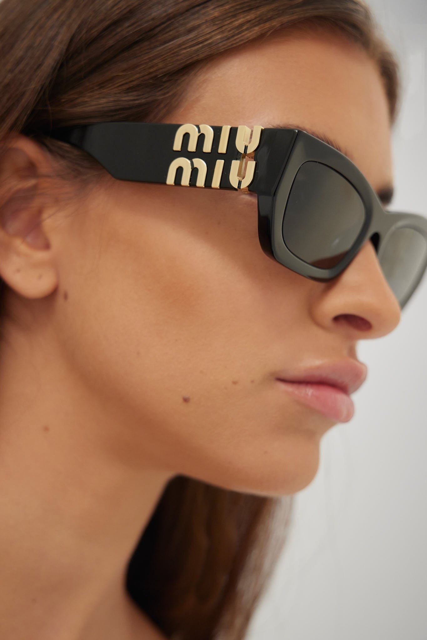 Miu Miu small cat-eye black sunglasses