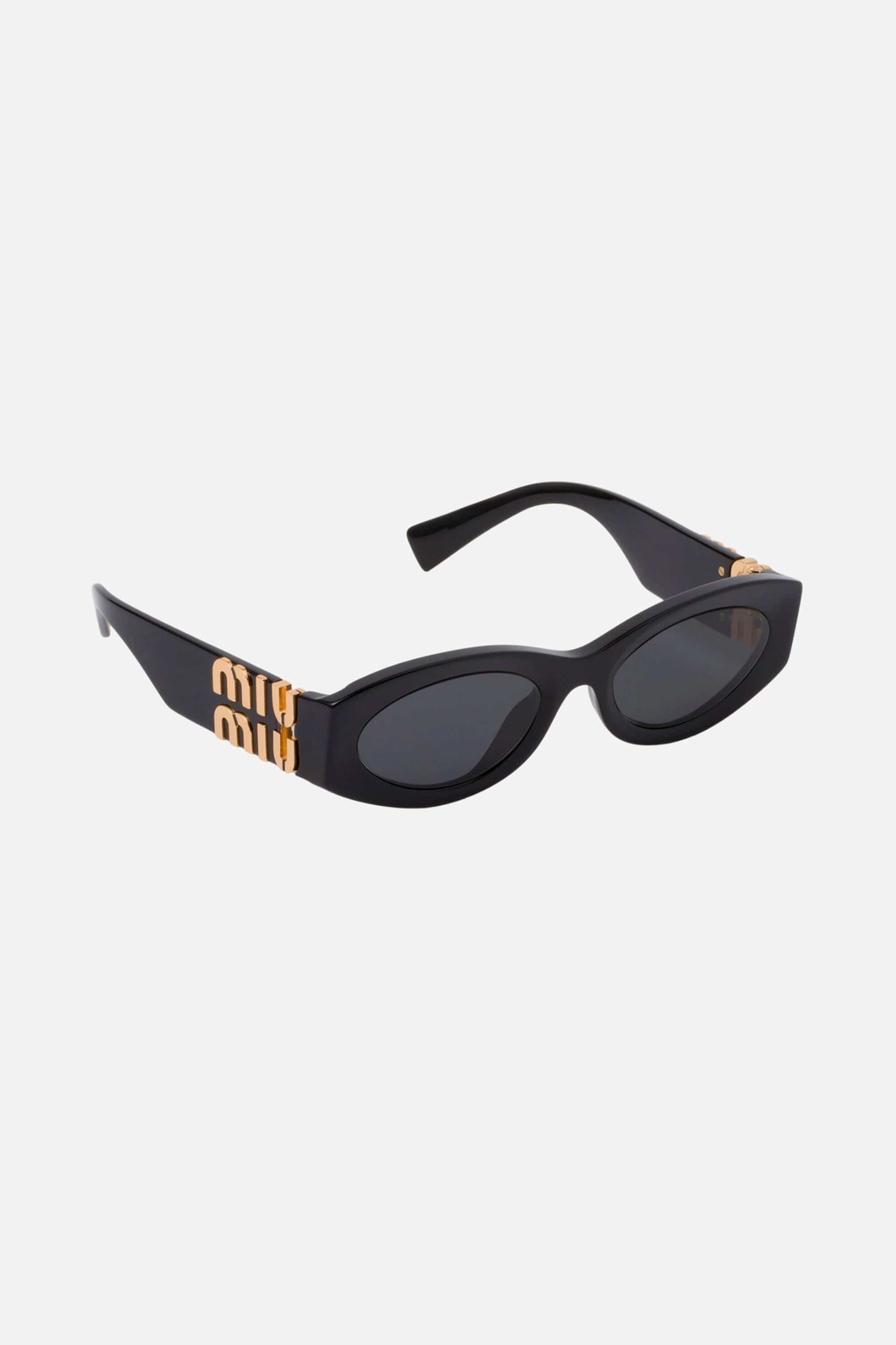 Miu Miu small oval black sunglasses