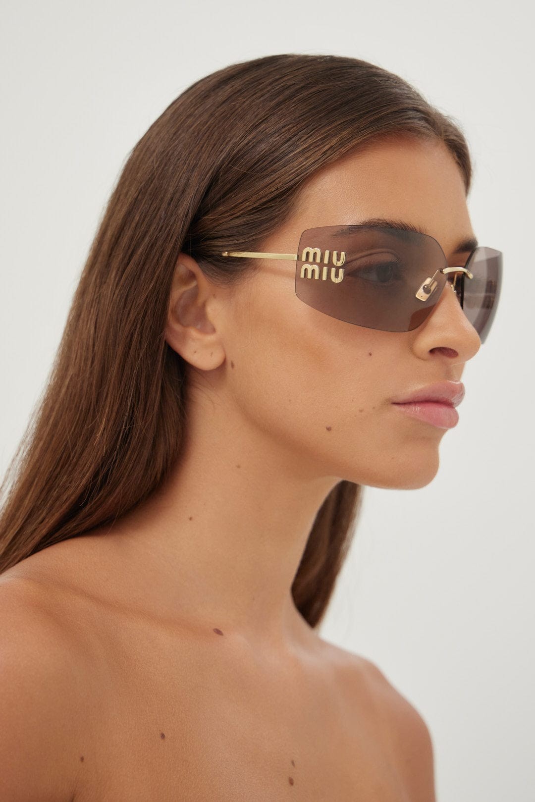 Miu Miu squared metal sunglasses with pink mirror and gold detail