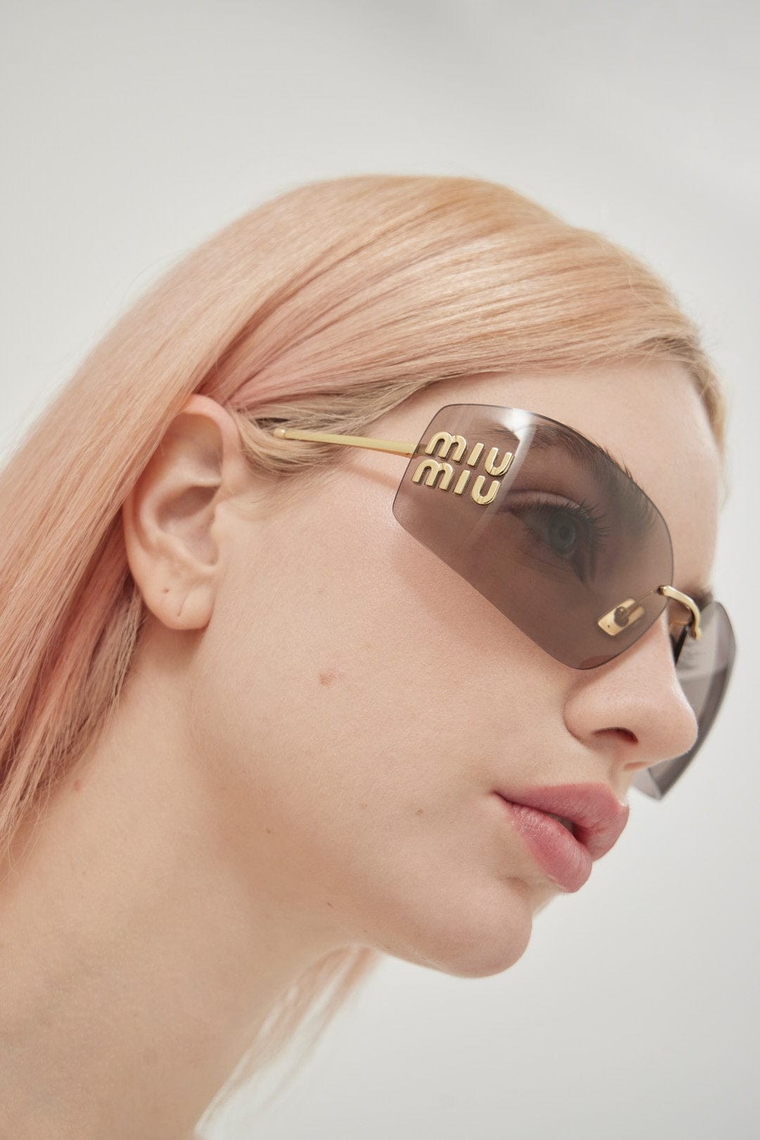 Miu Miu squared metal sunglasses with pink mirror and gold detail