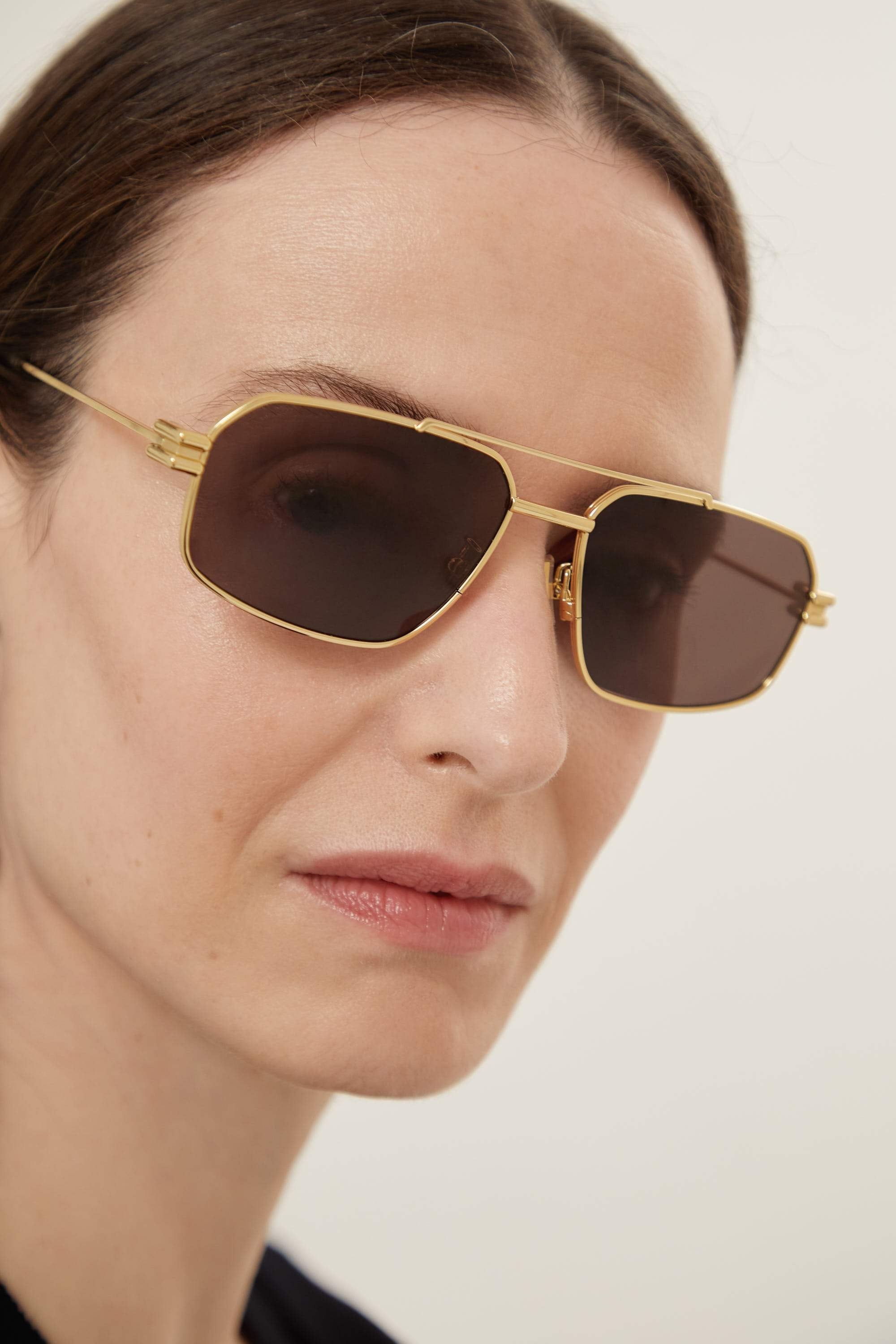 Bottega Veneta full metal caravan gold sunglasses