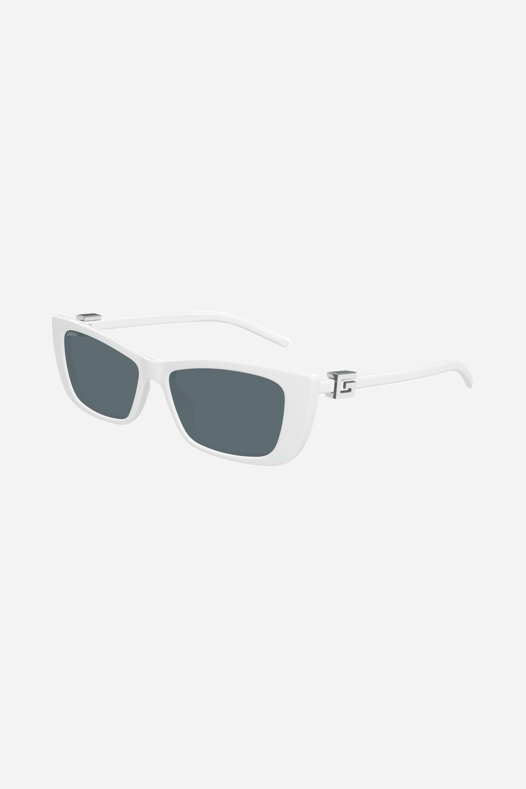 White cat-eye Gucci sunglasses with silver logo