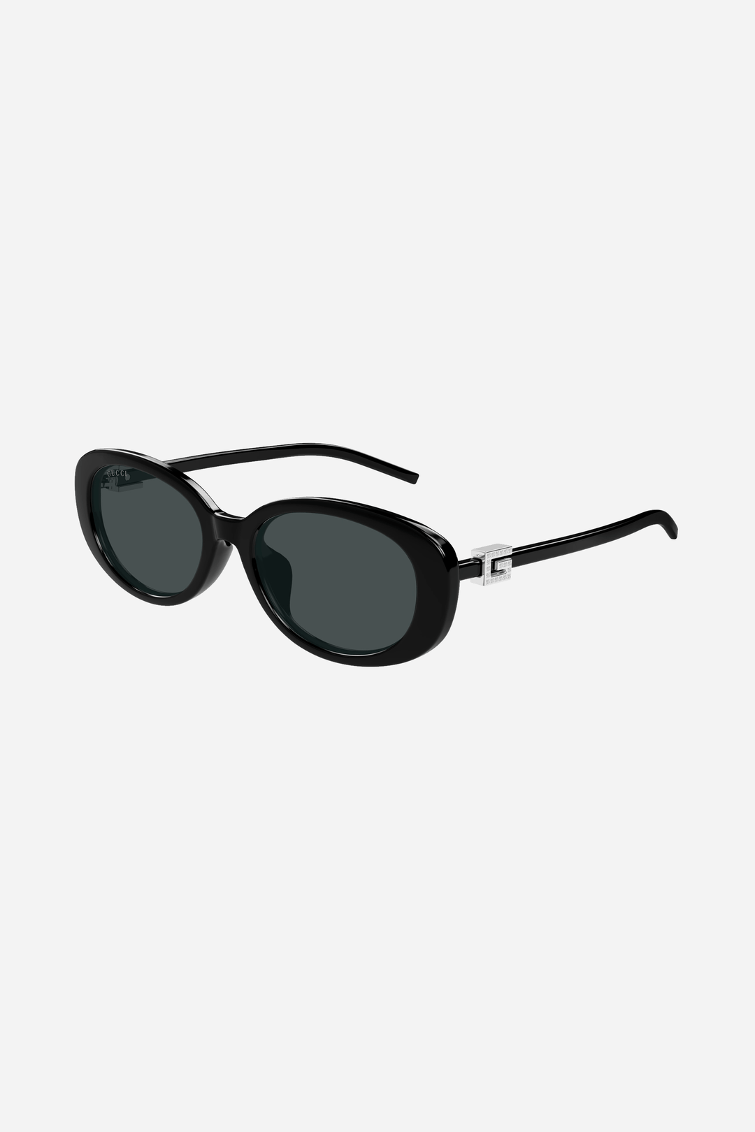 Black and grey oval Gucci sunglasses with silver logo